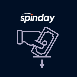A hand depositing cash under the Spinday logo